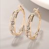 boucles d'oreilles petits anneaux sertis de strass dore