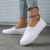 chaussures en toile pour homme ou femme blanc
