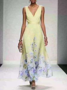 robe de soirée élégante en mousseline sans manches col croisé drapé jaune